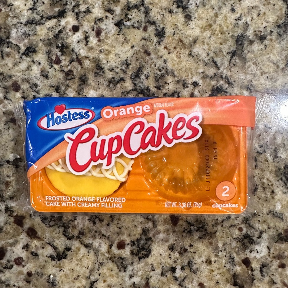 Sealed hostess orange cupcakes never been open missing a cupcake !!